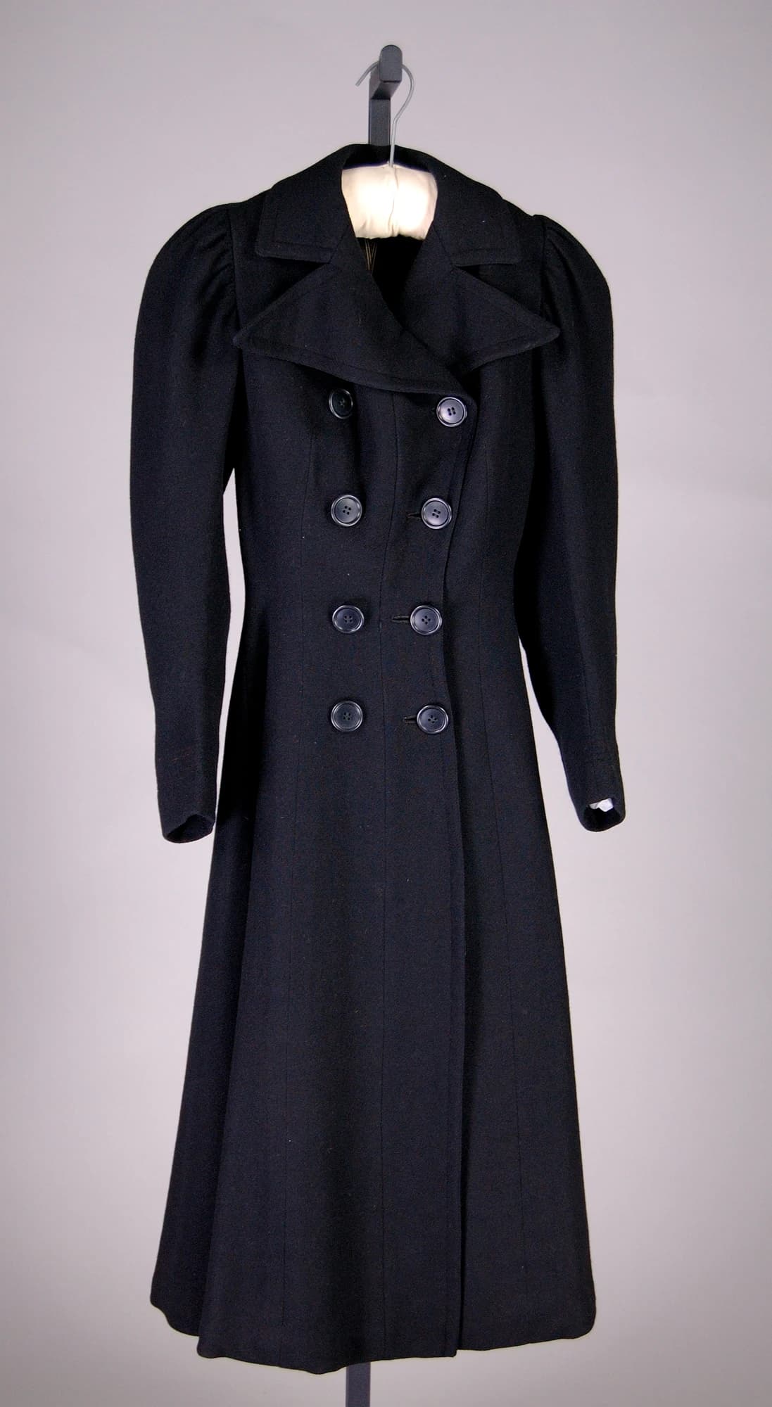 Black wool coat by Tuna and Moosbrugger dated 1890